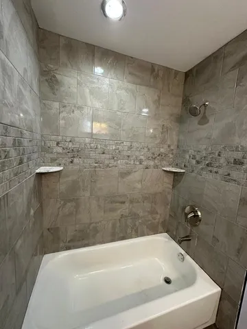 a bathroom with a bathtub