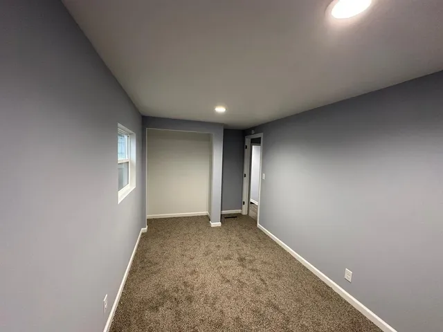 an empty room with a natural light