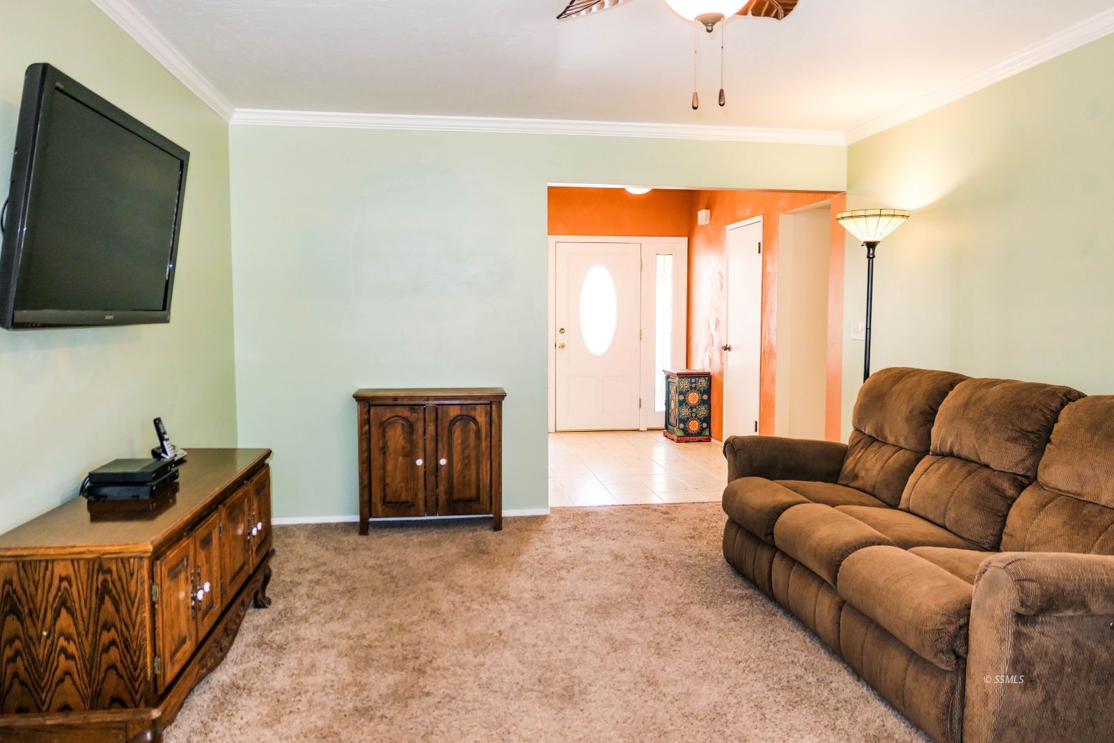 532 West Howell Avenue Ridgecrest, CA 93555 - Photo 10 of 44 a living room with furniture and a flat screen tv