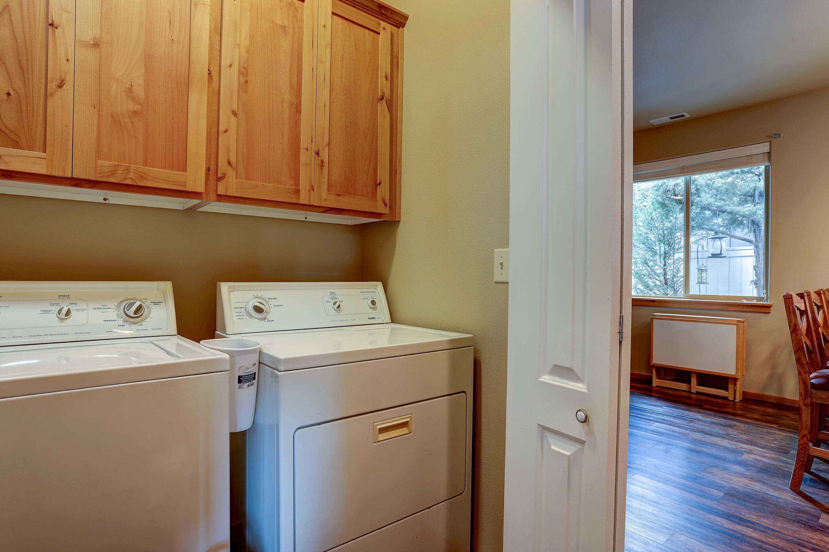 20659 Cooley Road Bend, OR 97701 - Photo 20 of 27 Roomy laundry closet with upper cabinetry.