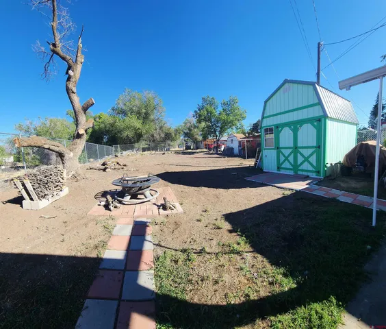 a view of a swimming pool with a patio