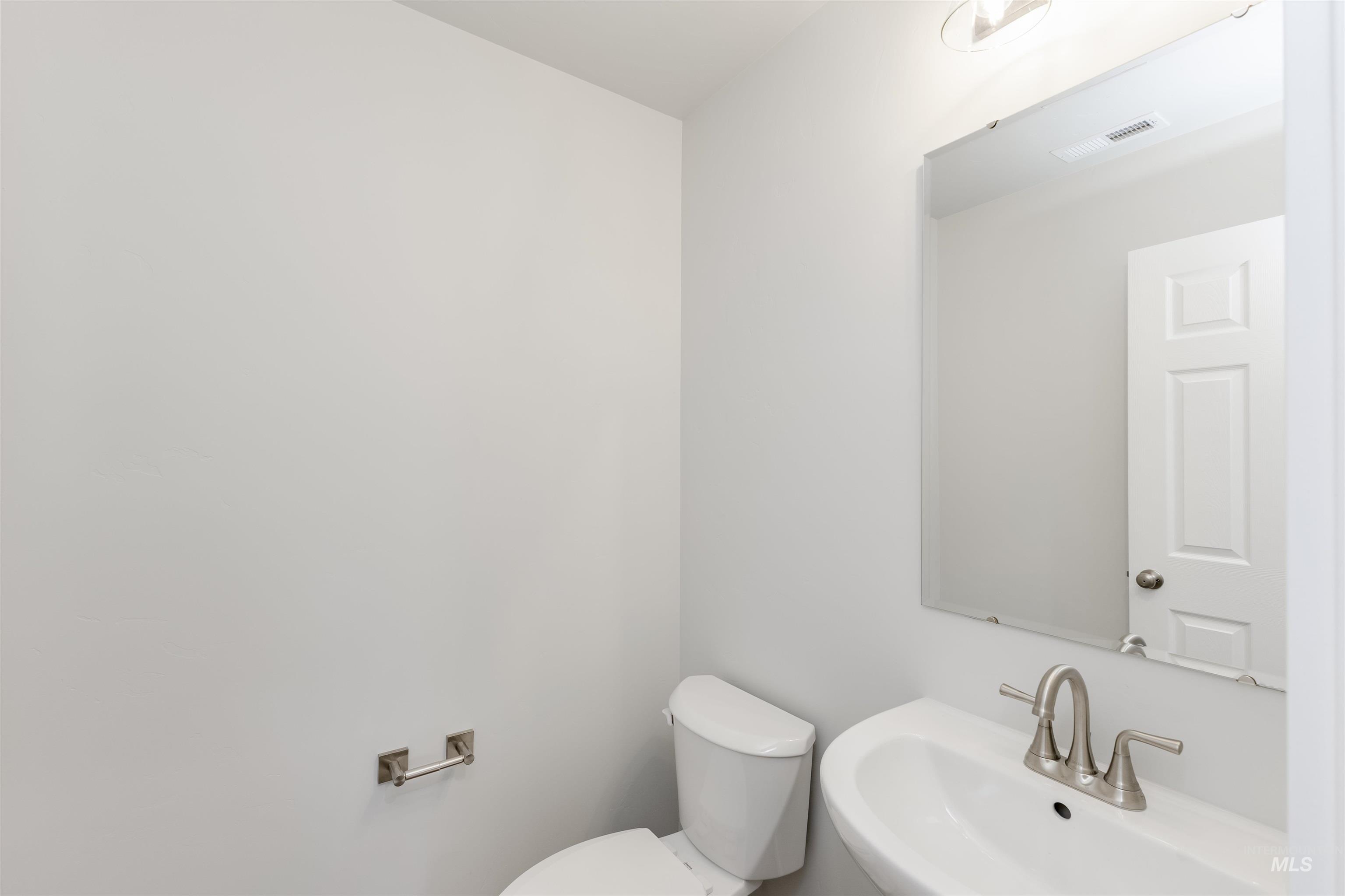 10865 Rutland Street Caldwell, ID 83605 - Photo 9 of 20 Bathroom featuring a sink and toilet