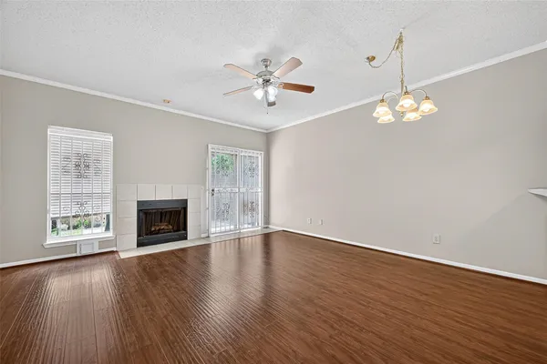 a white stove top oven sitting inside of a kitchen