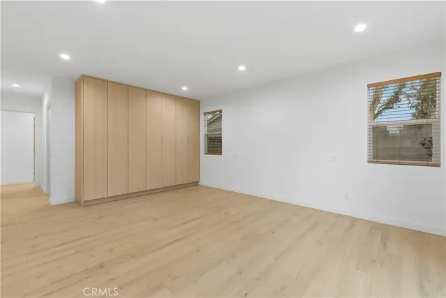 a kitchen with a stove and a microwave