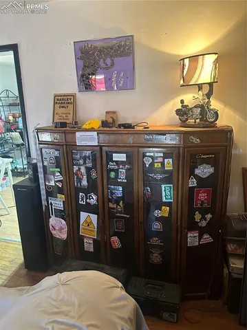 a bedroom with a bed and furniture