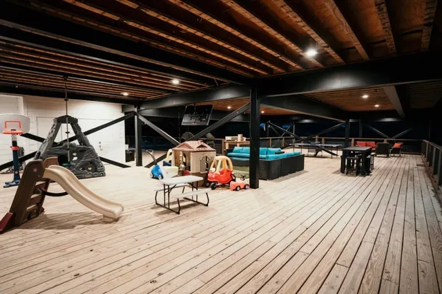 a view of a room with gym equipment