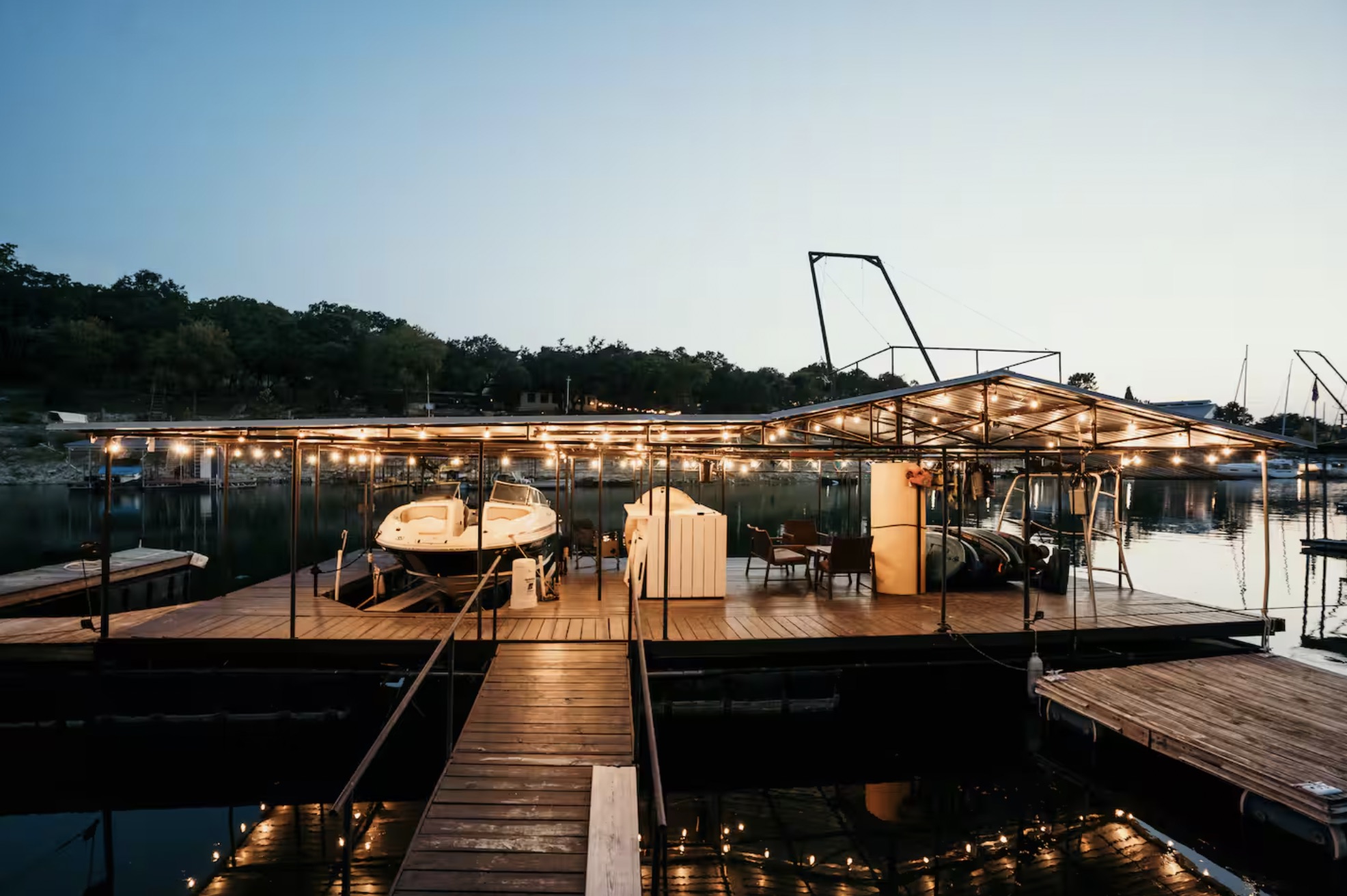 16323 Lake Loop Austin, TX 78734 - Photo 27 of 37 a view of a balcony with wooden floor and outdoor seating
