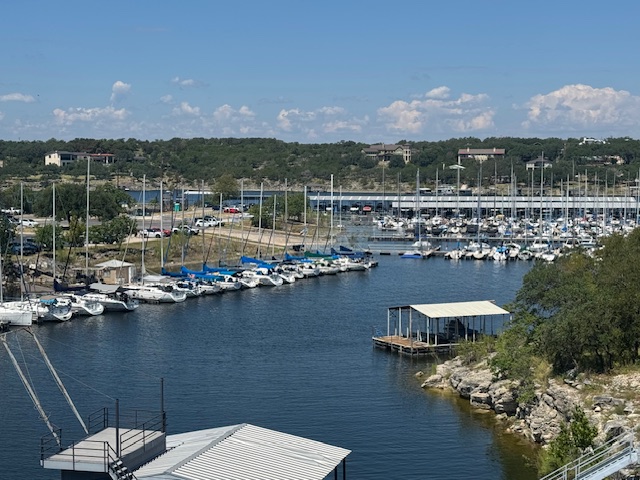 16323 Lake Loop Austin, TX 78734 - Photo 32 of 37 a view of a lake with a mountain view