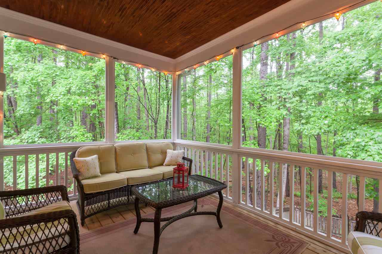 12208 Warwickshire Way Raleigh, NC 27613 - Photo 22 of 23 Massive 10x17 screened porch off the nook area. Screened Porch
