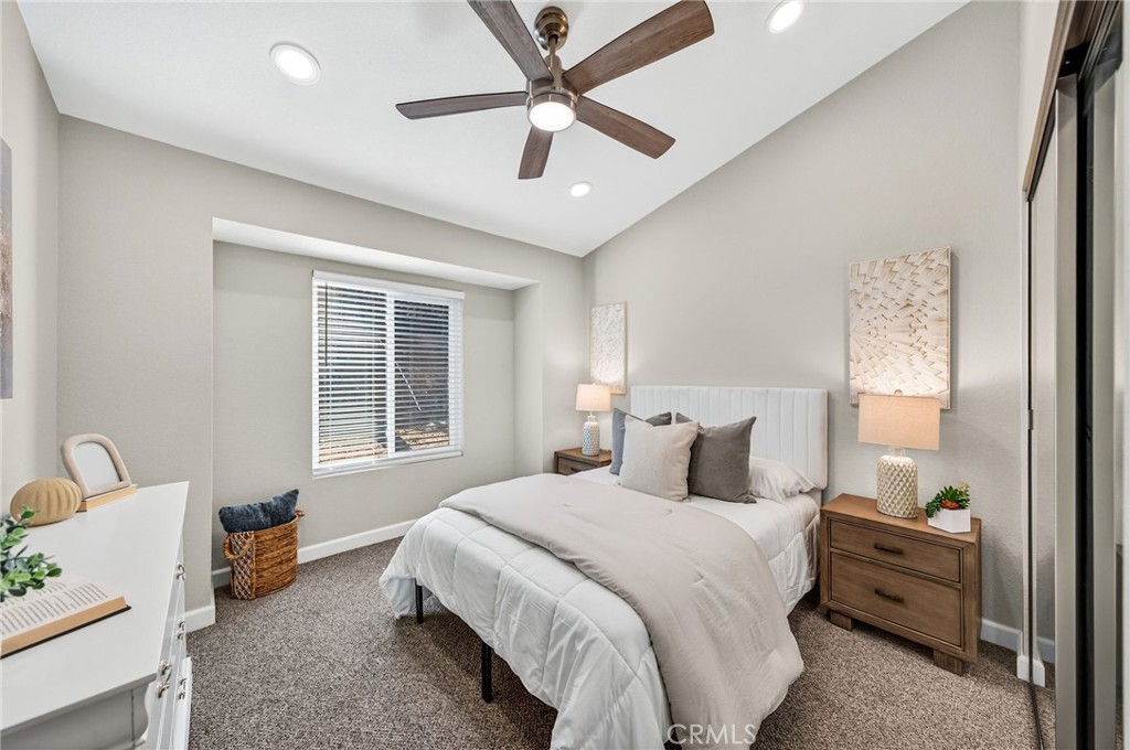 9290 Hot Springs Road Corona, CA 92883 - Photo 11 of 25 a bedroom with a bed and a window
