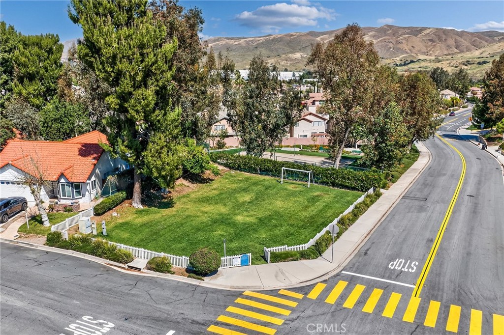 9290 Hot Springs Road Corona, CA 92883 - Photo 25 of 25 an aerial view of a house with a yard and lake view