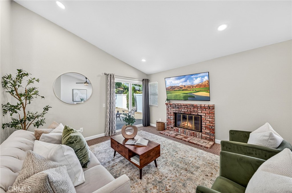 9290 Hot Springs Road Corona, CA 92883 - Photo 3 of 25 a living room with furniture fireplace and window