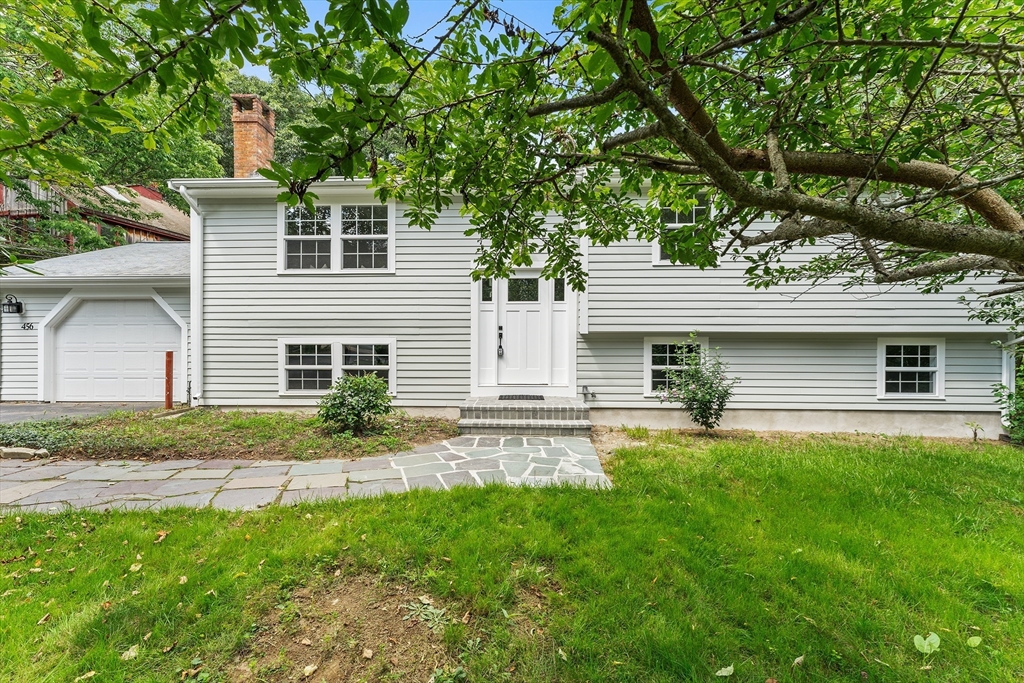 456 Parsonage Street Marshfield, MA 02050 - Photo 1 of 41 a backyard of a house with seating space