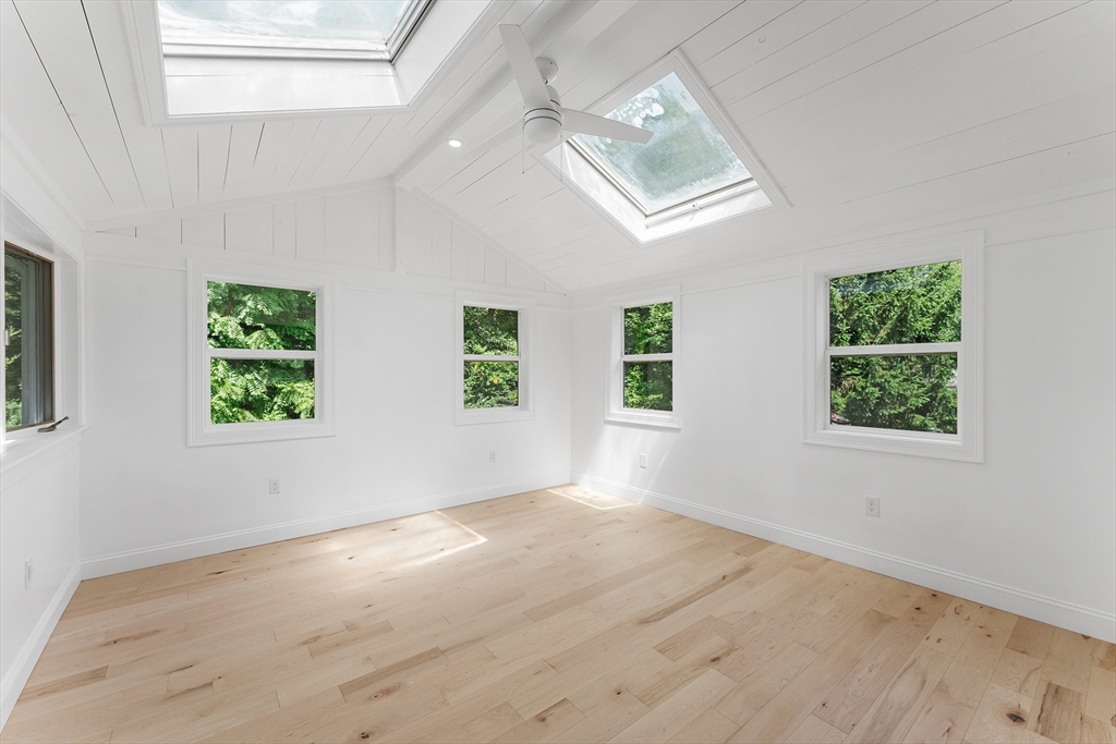 456 Parsonage Street Marshfield, MA 02050 - Photo 18 of 41 an empty room with windows