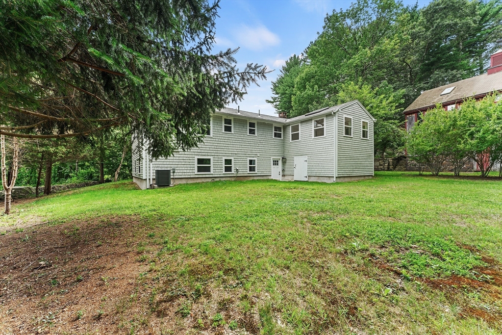 456 Parsonage Street Marshfield, MA 02050 - Photo 21 of 41 a view of a house with a yard