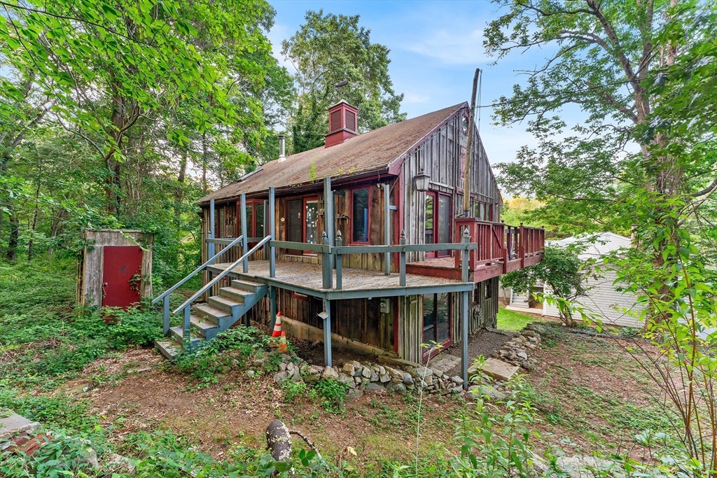 456 Parsonage Street Marshfield, MA 02050 - Photo 23 of 41 a view of a house with a yard and deck