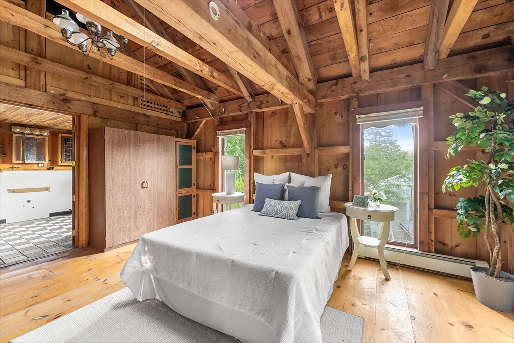 456 Parsonage Street Marshfield, MA 02050 - Photo 27 of 41 a bedroom with a bed and a window