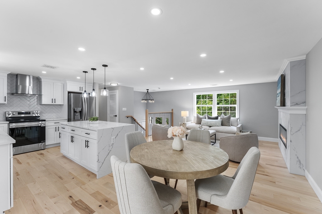 456 Parsonage Street Marshfield, MA 02050 - Photo 6 of 41 a large kitchen with a table and chairs