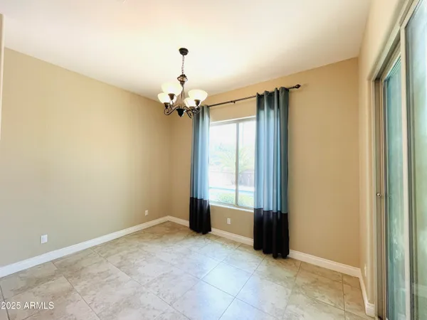 a view of a living room and kitchen view