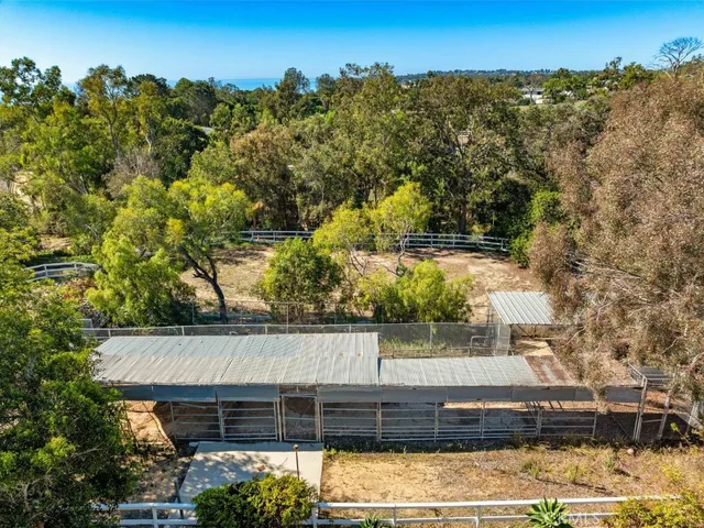 a view of a house with a tree