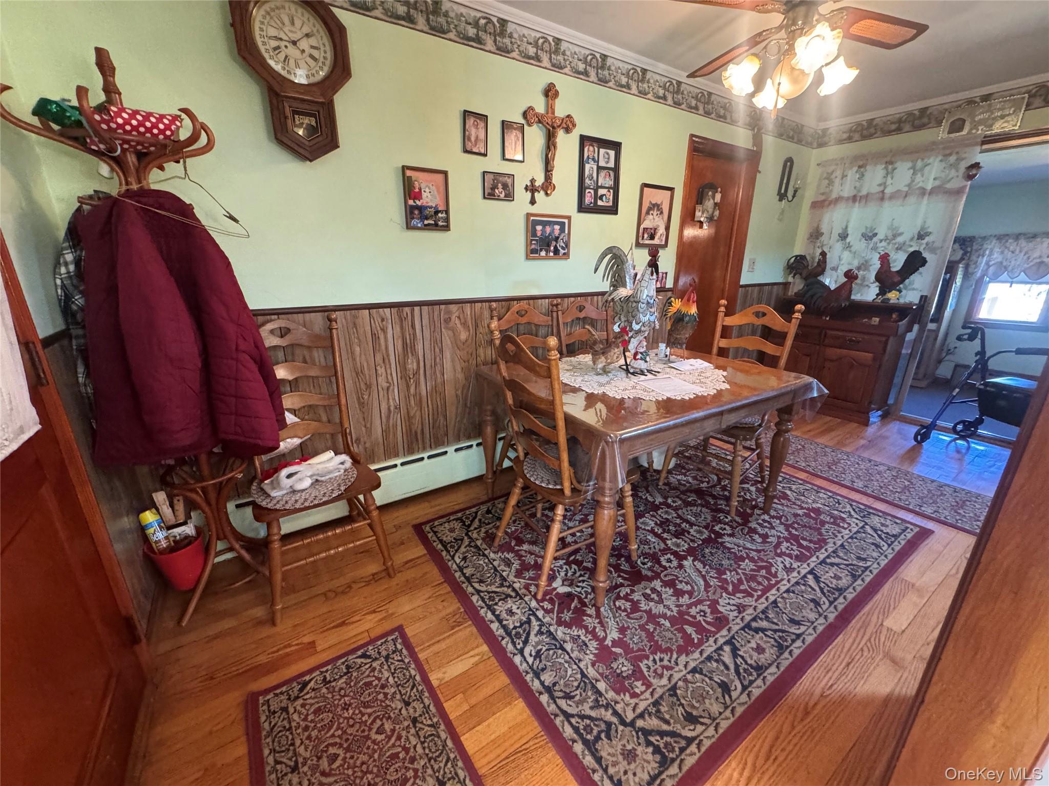 367 Mt Eve Road Goshen, NY 10924 - Photo 15 of 37 a living room with a couch and a chandelier