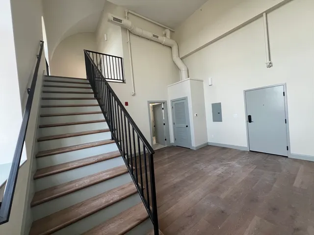 a view of a hallway with staircase