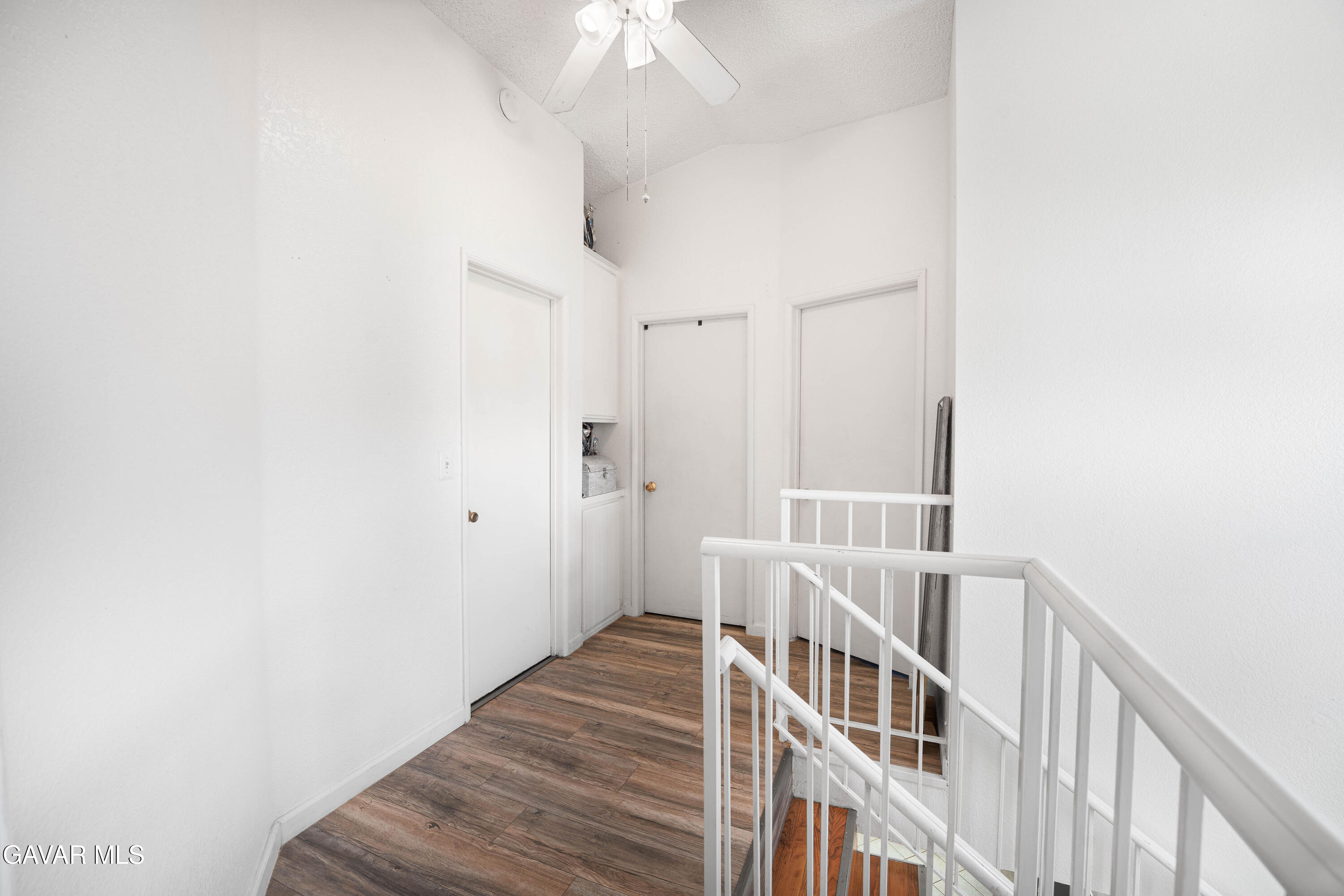 5009 East Ave R 11 Palmdale, CA 93552 - Photo 14 of 23 a view of an entryway with wooden floor
