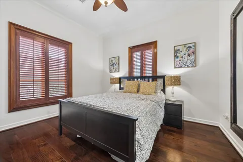 a spacious bathroom with a double vanity sink and a mirror