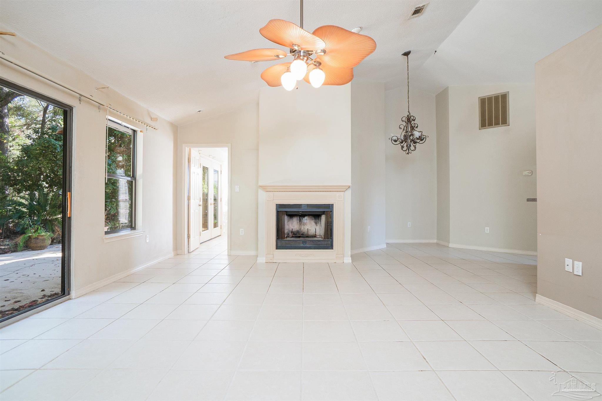 1860 Sparrow Lane Navarre, FL 32566 - Photo 18 of 43 a view of an empty room with a window