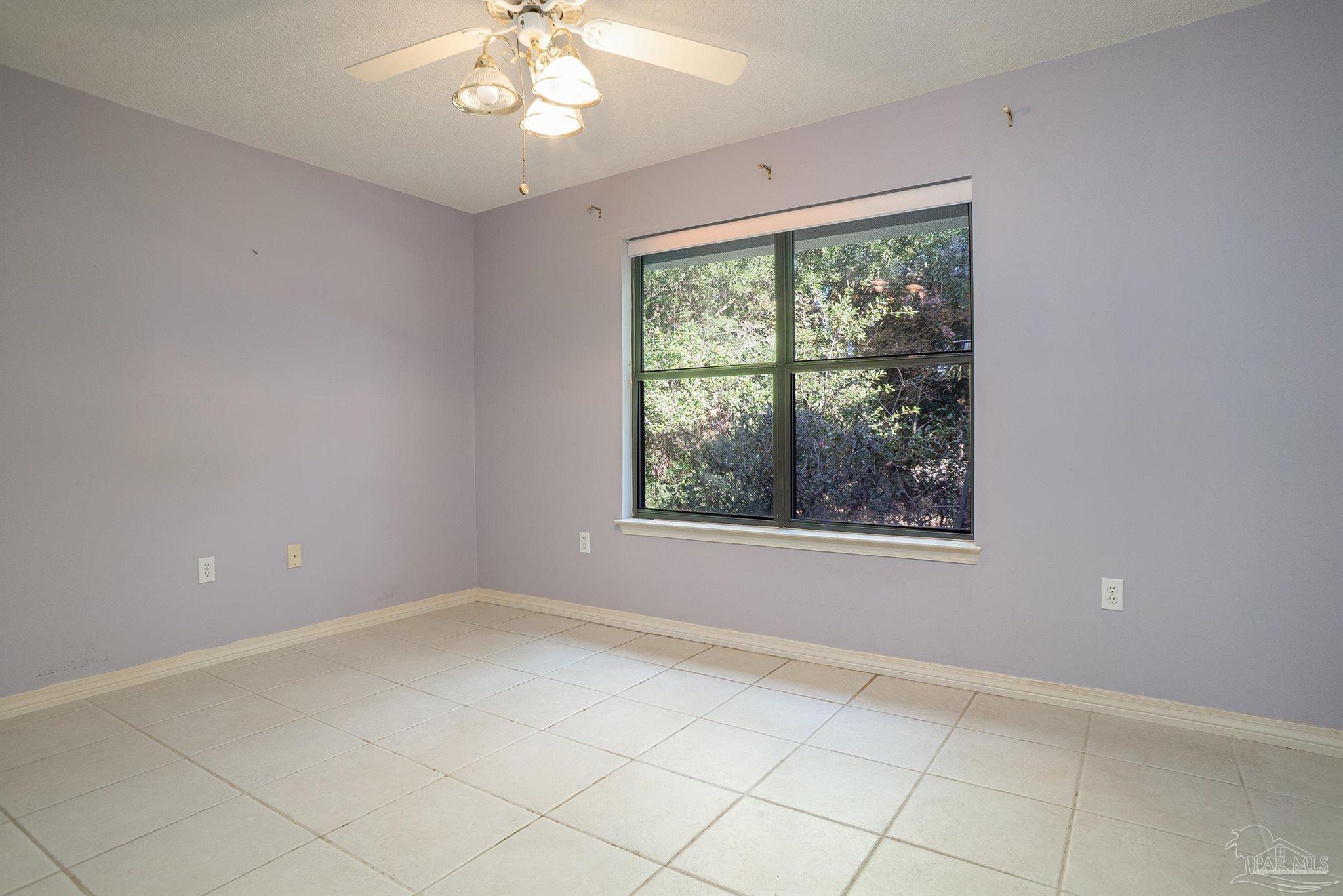 1860 Sparrow Lane Navarre, FL 32566 - Photo 39 of 43 a view of an empty room with a window