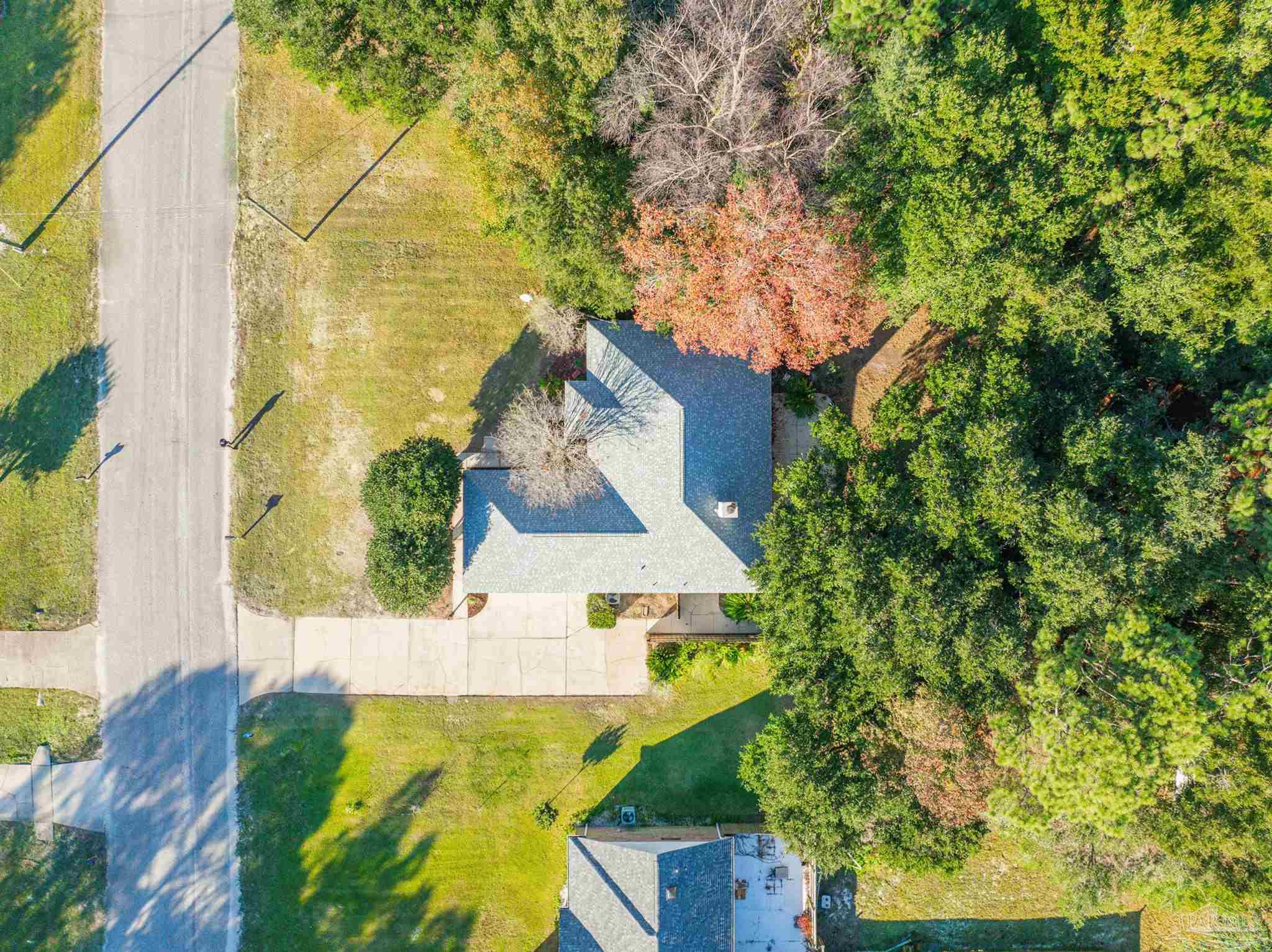 1860 Sparrow Lane Navarre, FL 32566 - Photo 8 of 43 view of a house with a yard