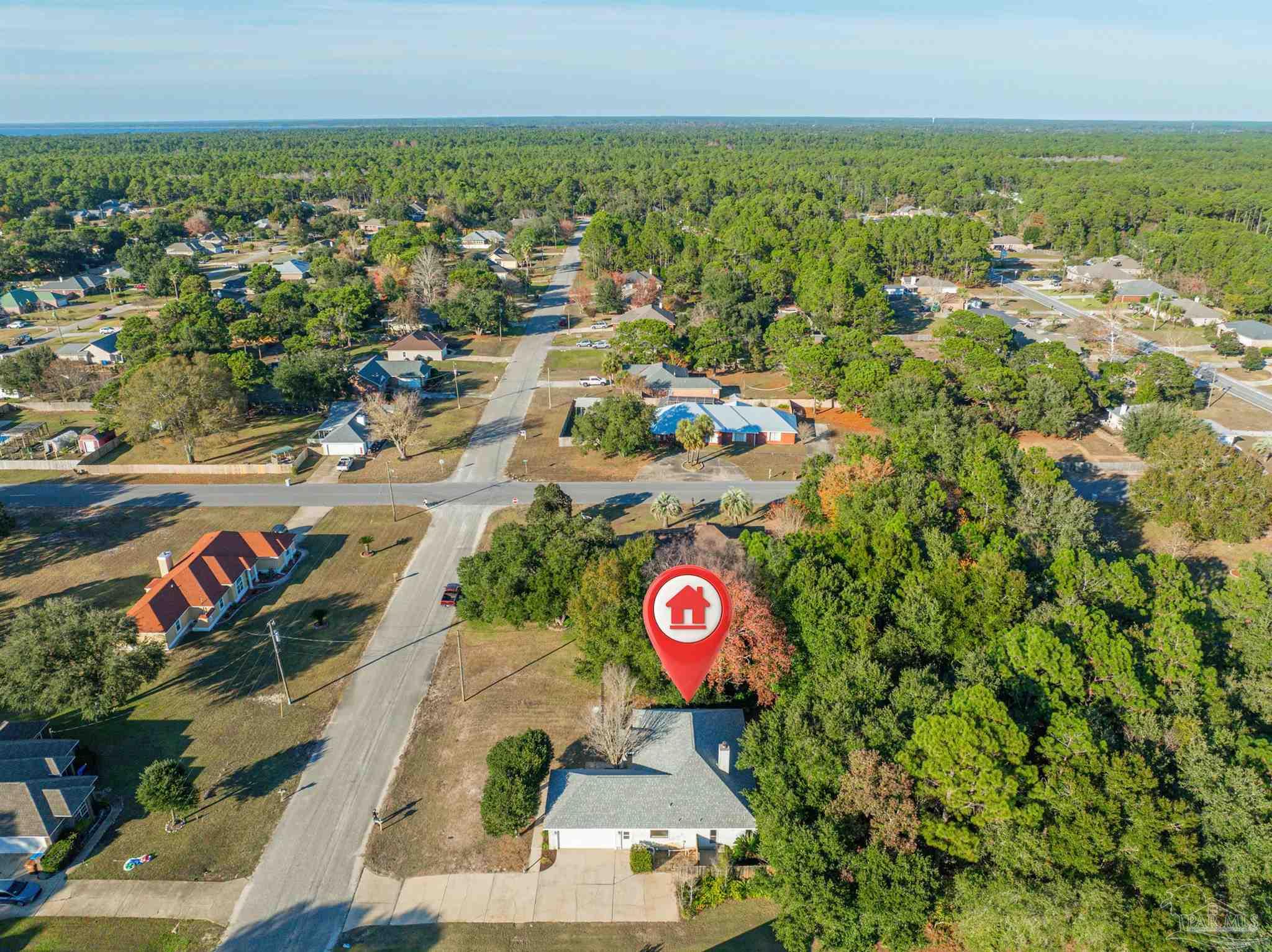 1860 Sparrow Lane Navarre, FL 32566 - Photo 9 of 43 an aerial view of residential houses with outdoor space