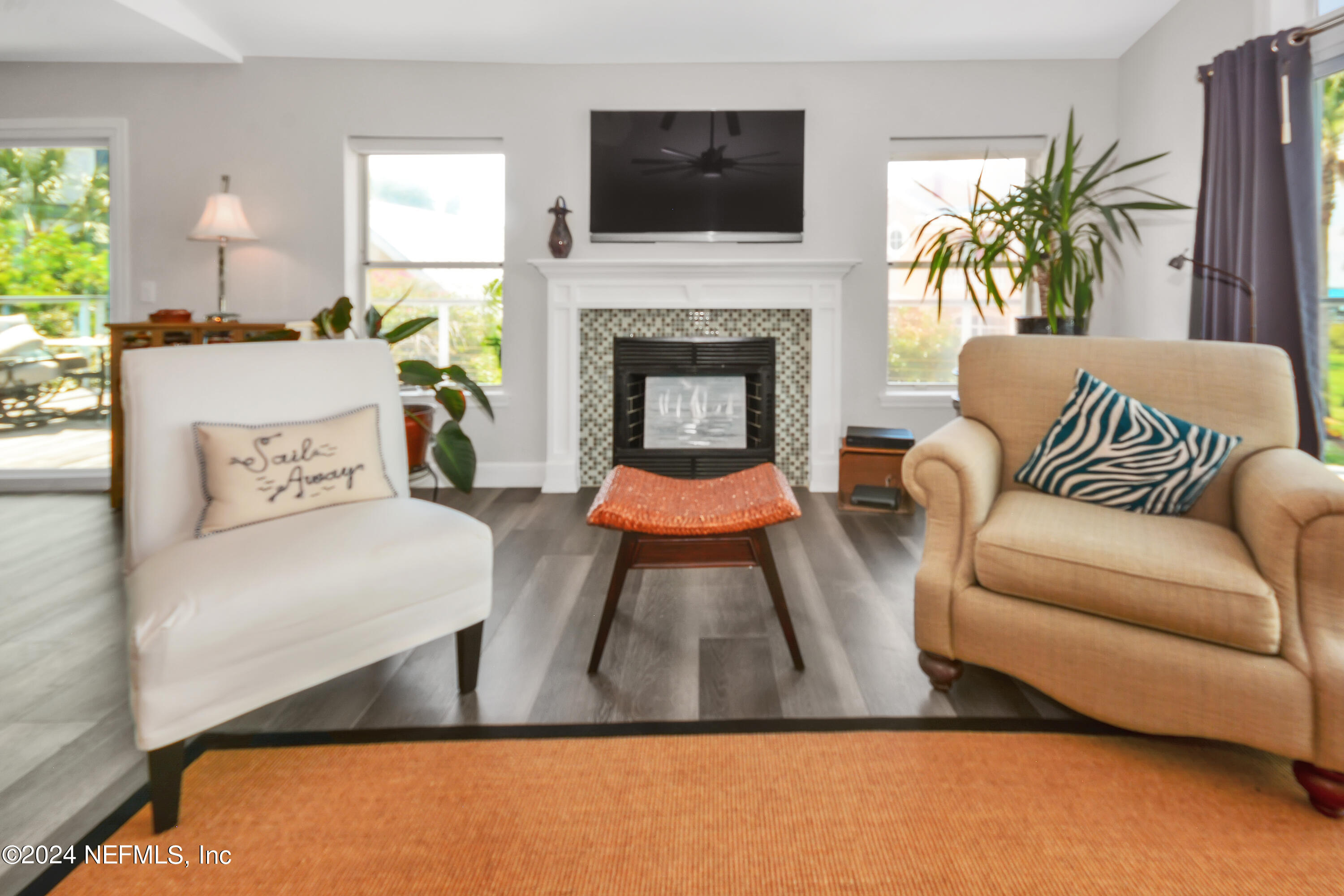 2740 Harbor Court St. Augustine, FL 32084 - Photo 13 of 53 a living room with furniture and a fireplace