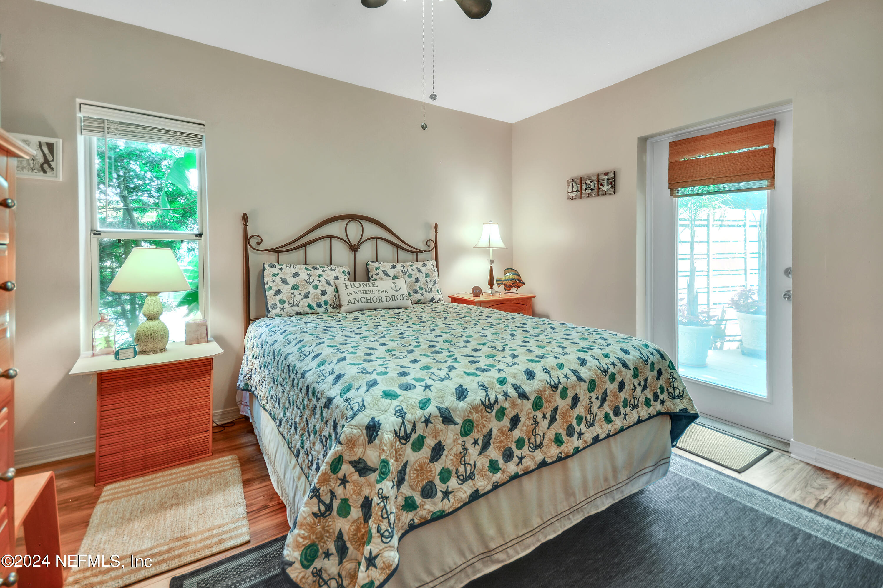 2740 Harbor Court St. Augustine, FL 32084 - Photo 28 of 53 a bedroom with a large bed and a window