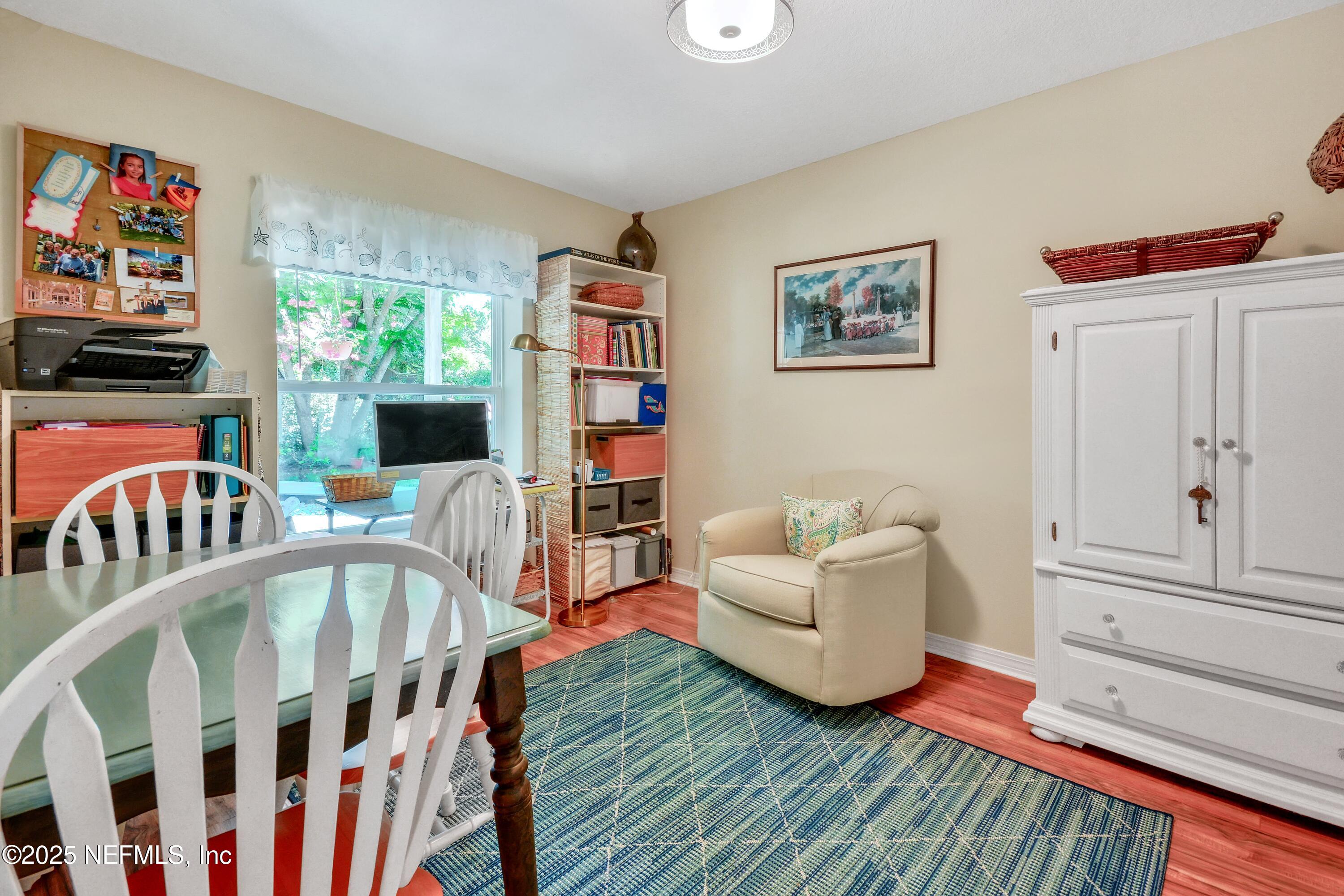2740 Harbor Court St. Augustine, FL 32084 - Photo 30 of 53 a living room with furniture and a flat screen tv