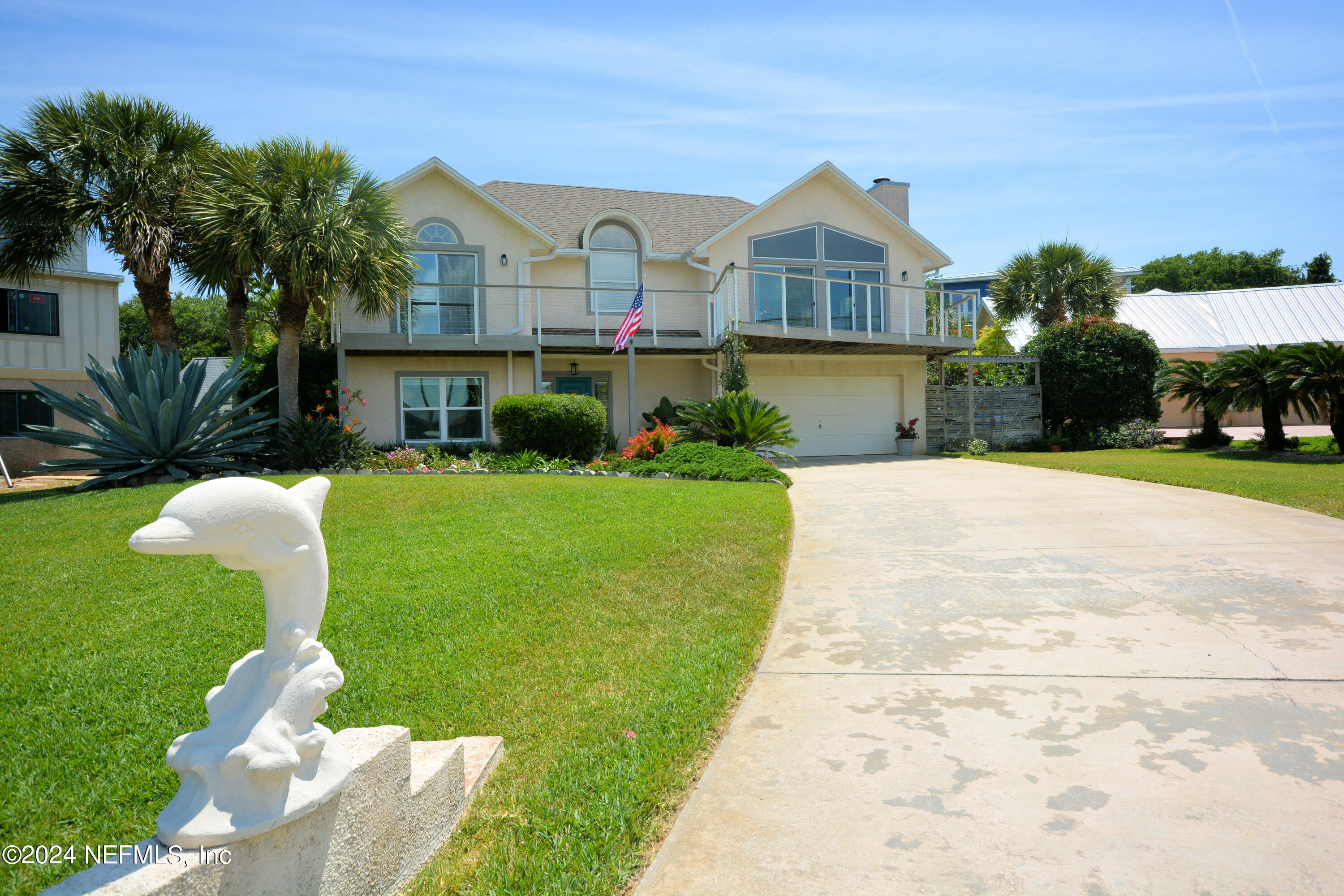 2740 Harbor Court St. Augustine, FL 32084 - Photo 33 of 53 a front view of a house with a yard and garage