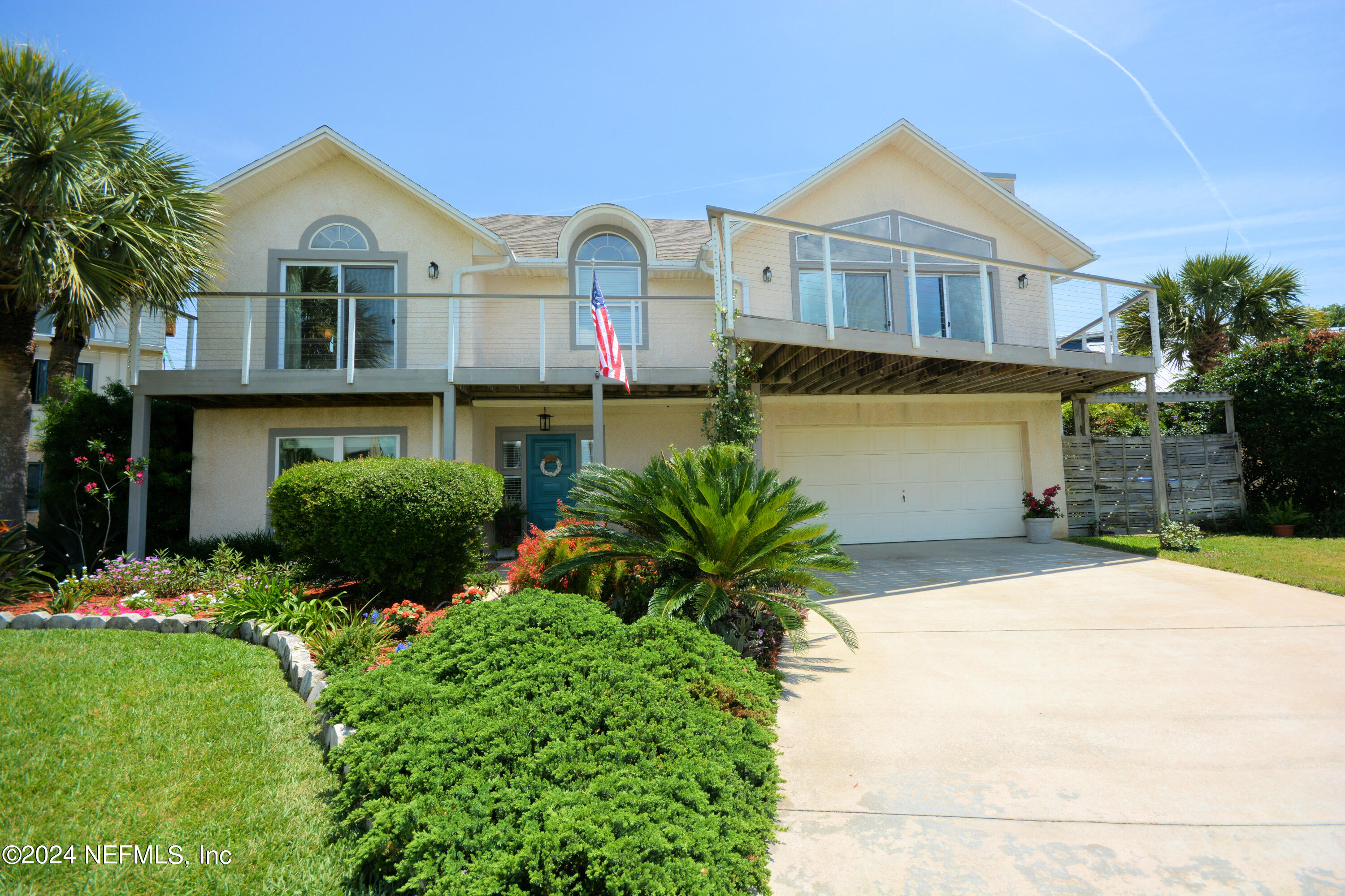2740 Harbor Court St. Augustine, FL 32084 - Photo 35 of 53 a front view of a house with a yard and garage