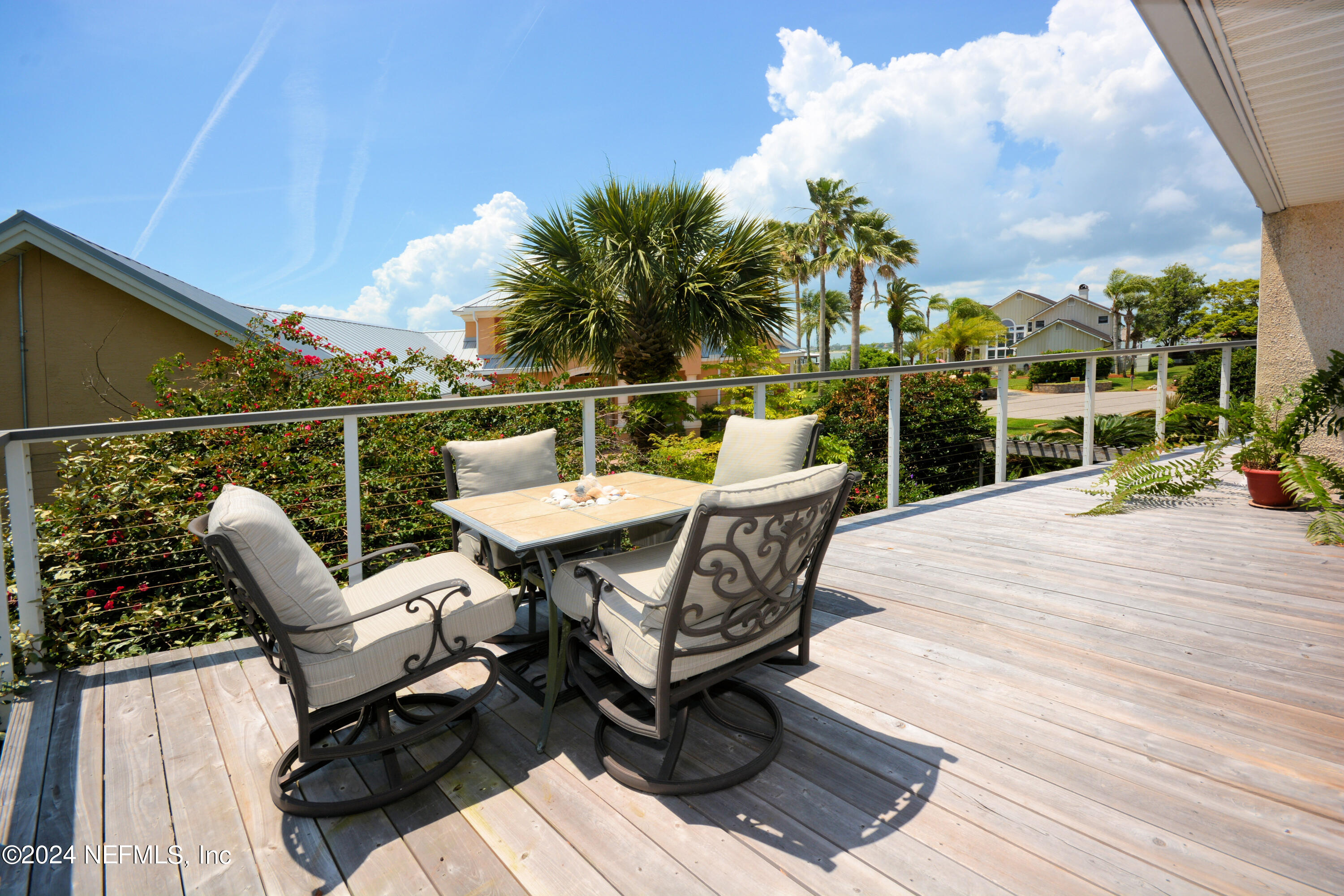 2740 Harbor Court St. Augustine, FL 32084 - Photo 38 of 53 a roof deck with a table and chairs