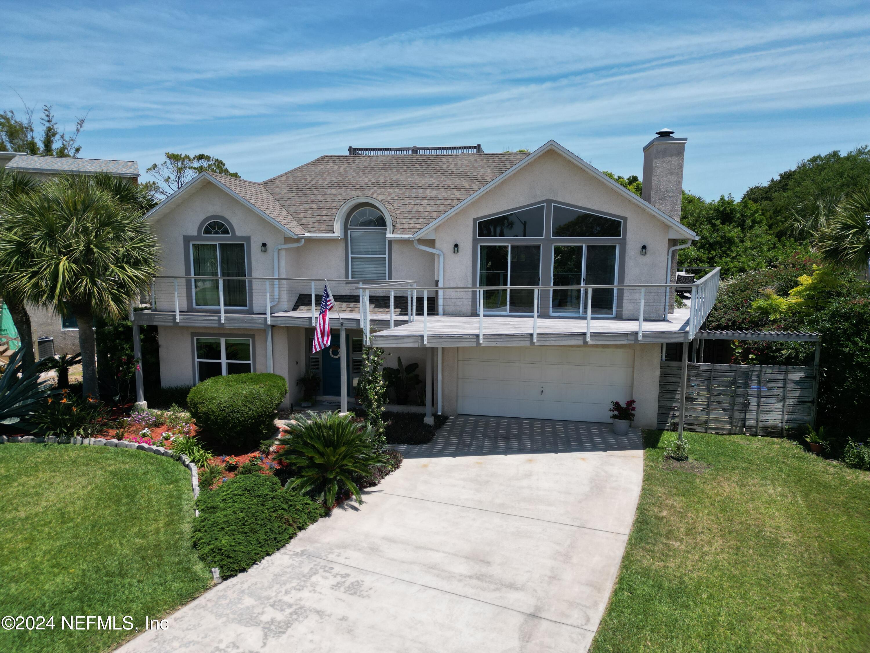 2740 Harbor Court St. Augustine, FL 32084 - Photo 4 of 53 a front view of a house with garden