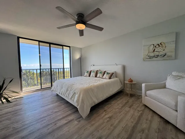 a view of wooden balcony with outdoor seating