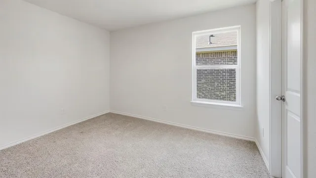 an empty room with a window