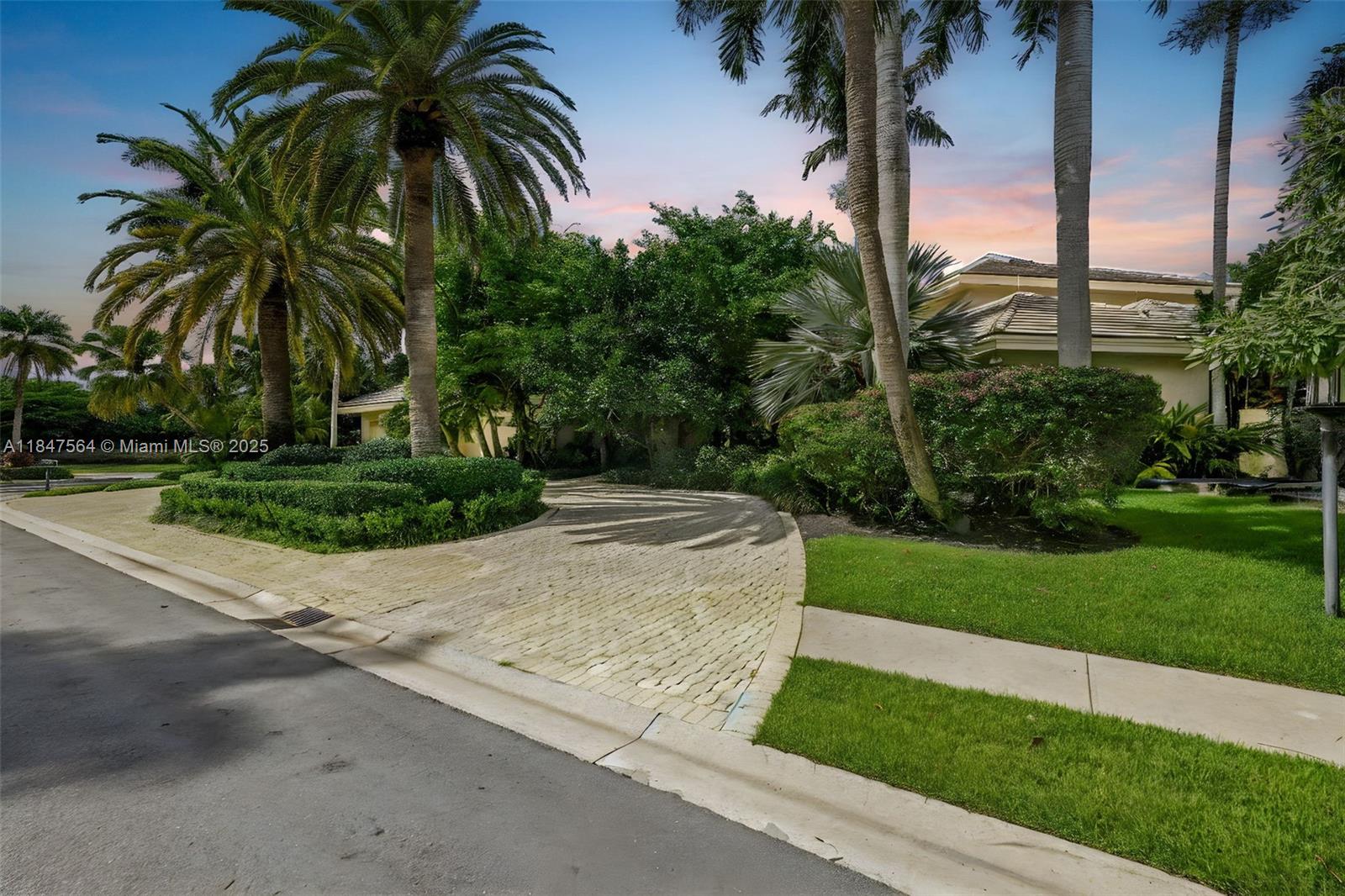 21034 Rosedown Court Boca Raton, FL 33433 - Photo 2 of 44 a view of a yard with palm trees