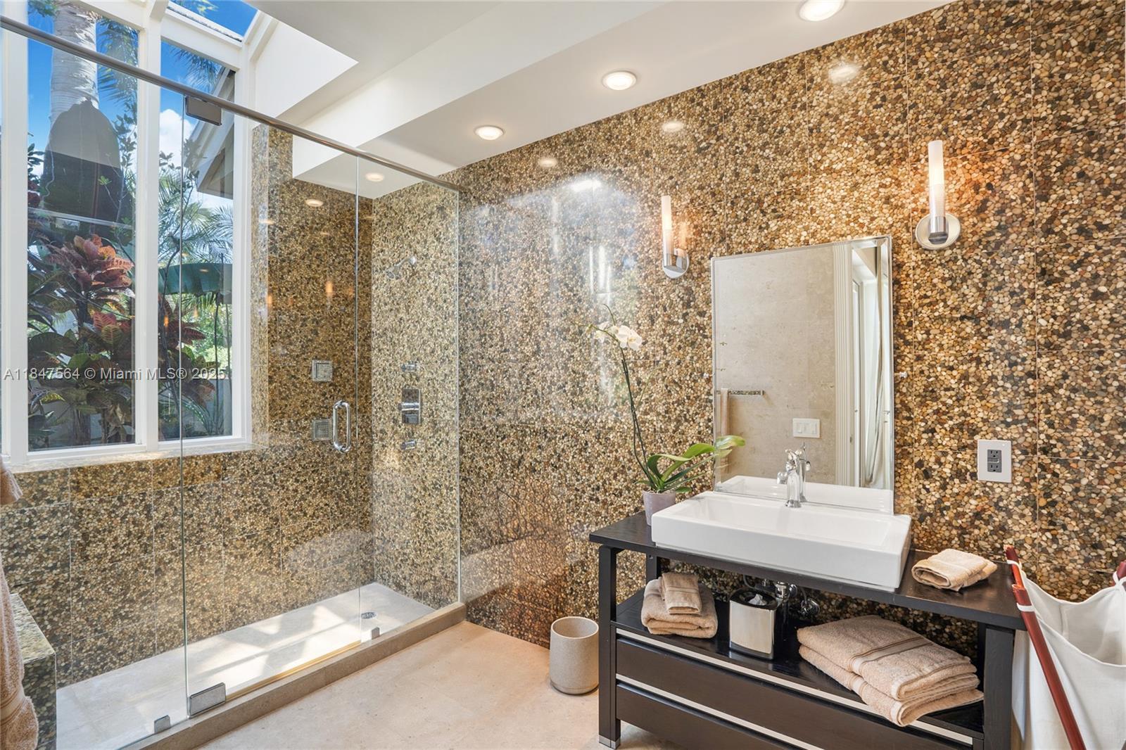 21034 Rosedown Court Boca Raton, FL 33433 - Photo 22 of 44 a bathroom with a sink and a mirror