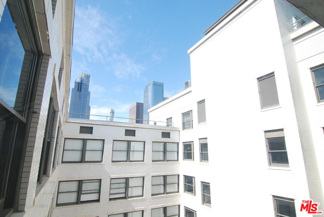 460 South Spring Street, Unit 608 Los Angeles, CA 90013 - Photo 19 of 31 a view of building with windows