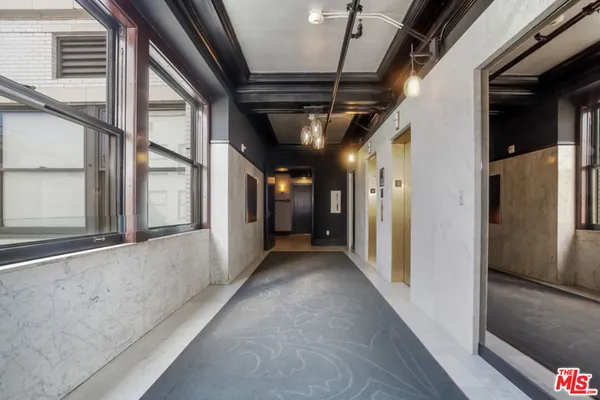 a view of hallway with stairs