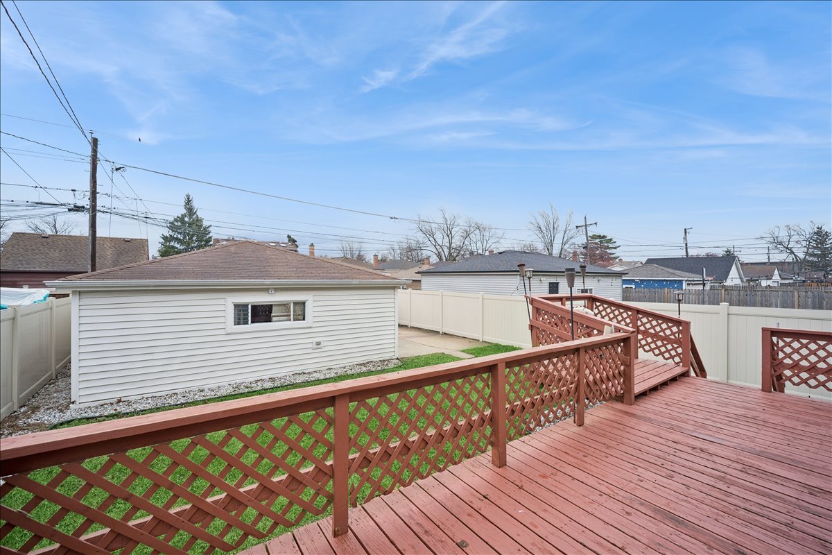 2455 North Rhodes Avenue River Grove, IL 60171 - Photo 16 of 24 a view of a balcony with wooden floor and city view