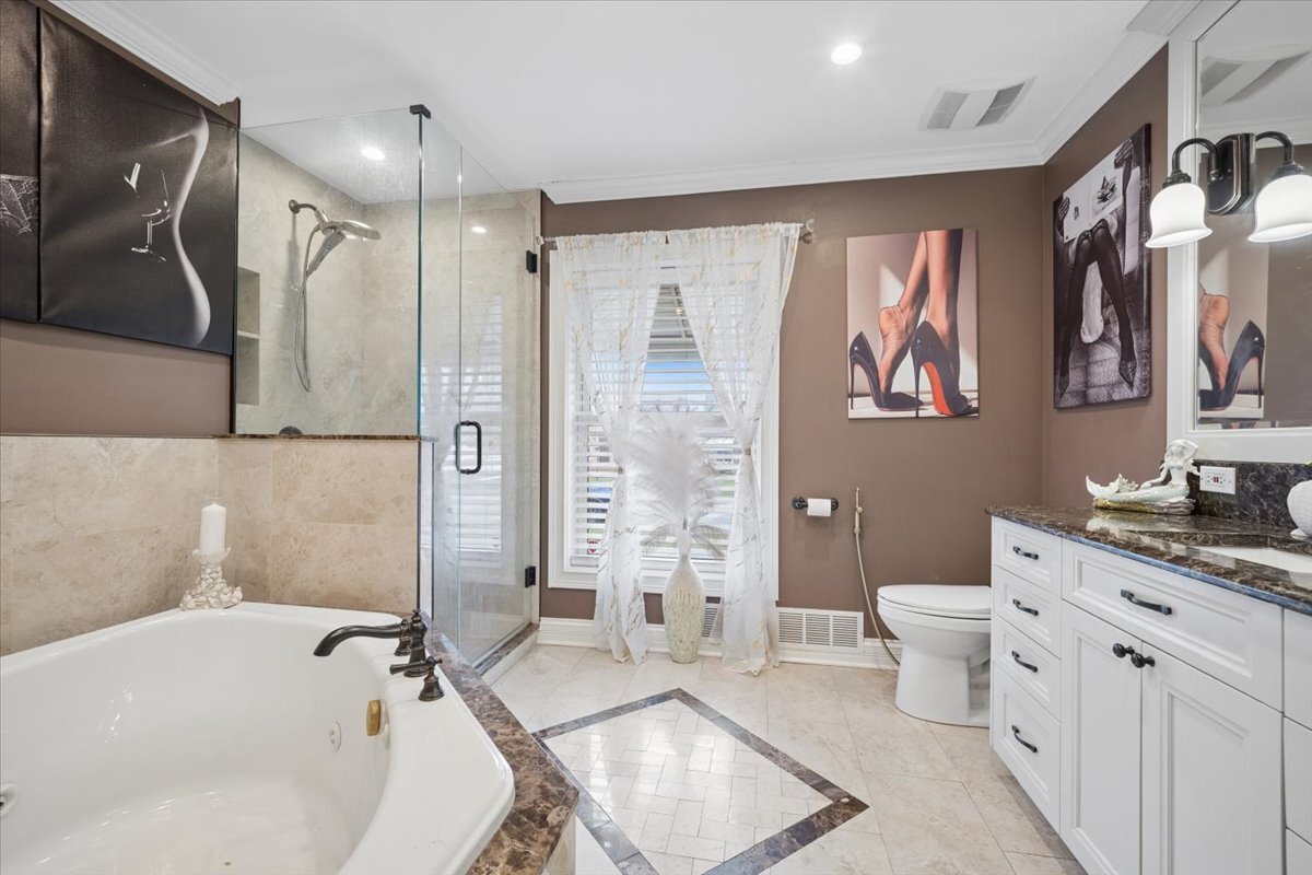 2455 North Rhodes Avenue River Grove, IL 60171 - Photo 10 of 24 a bathroom with a sink a toilet and shower