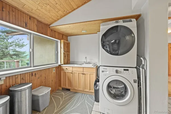 a view of a hallway with washer and dryer