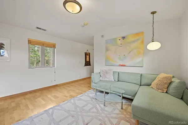 a bed room with a bed and a table