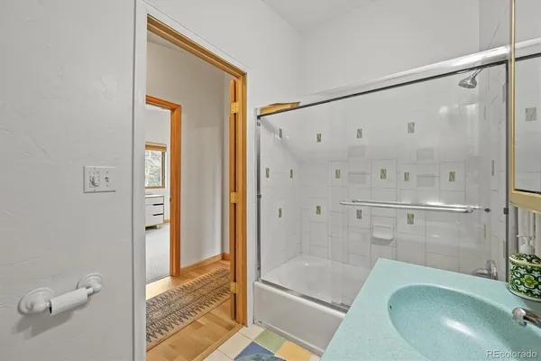 a room with a bed and a window